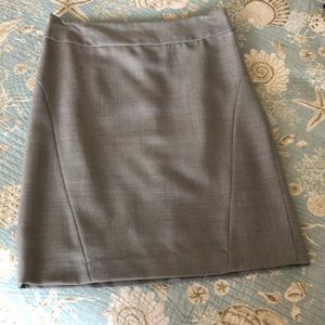 Gray skirt.